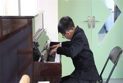 图片10 钢琴《景颇山歌》.jpg